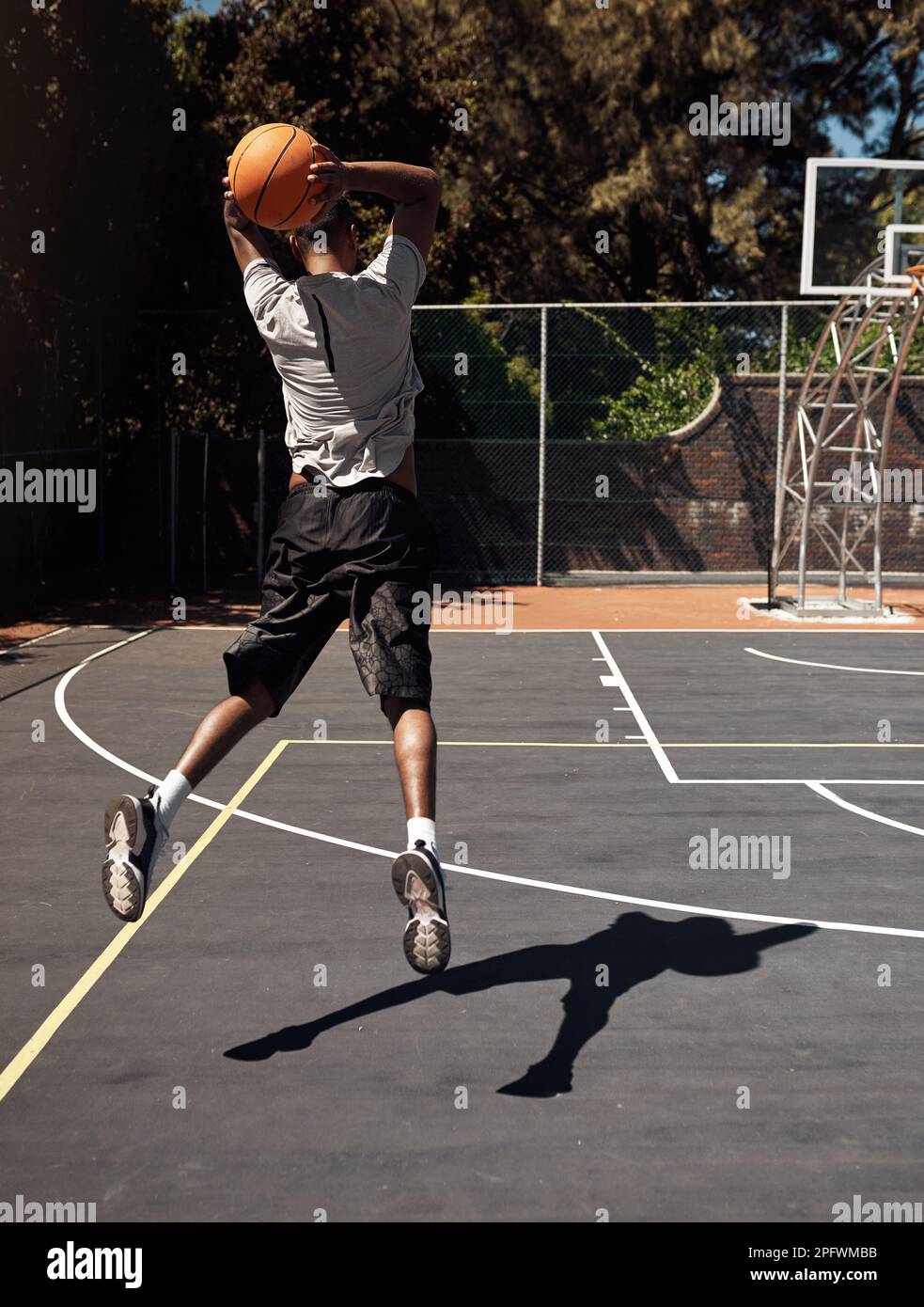 Shooting is the most important skill in basketball. Rearview shot of a