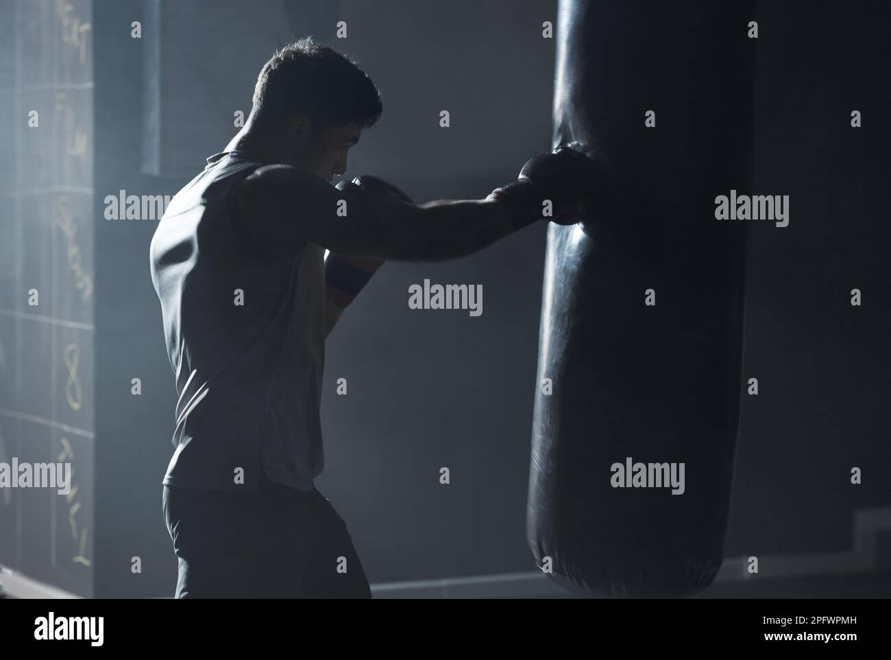 With self discipline comes success. a young man practicing his boxing