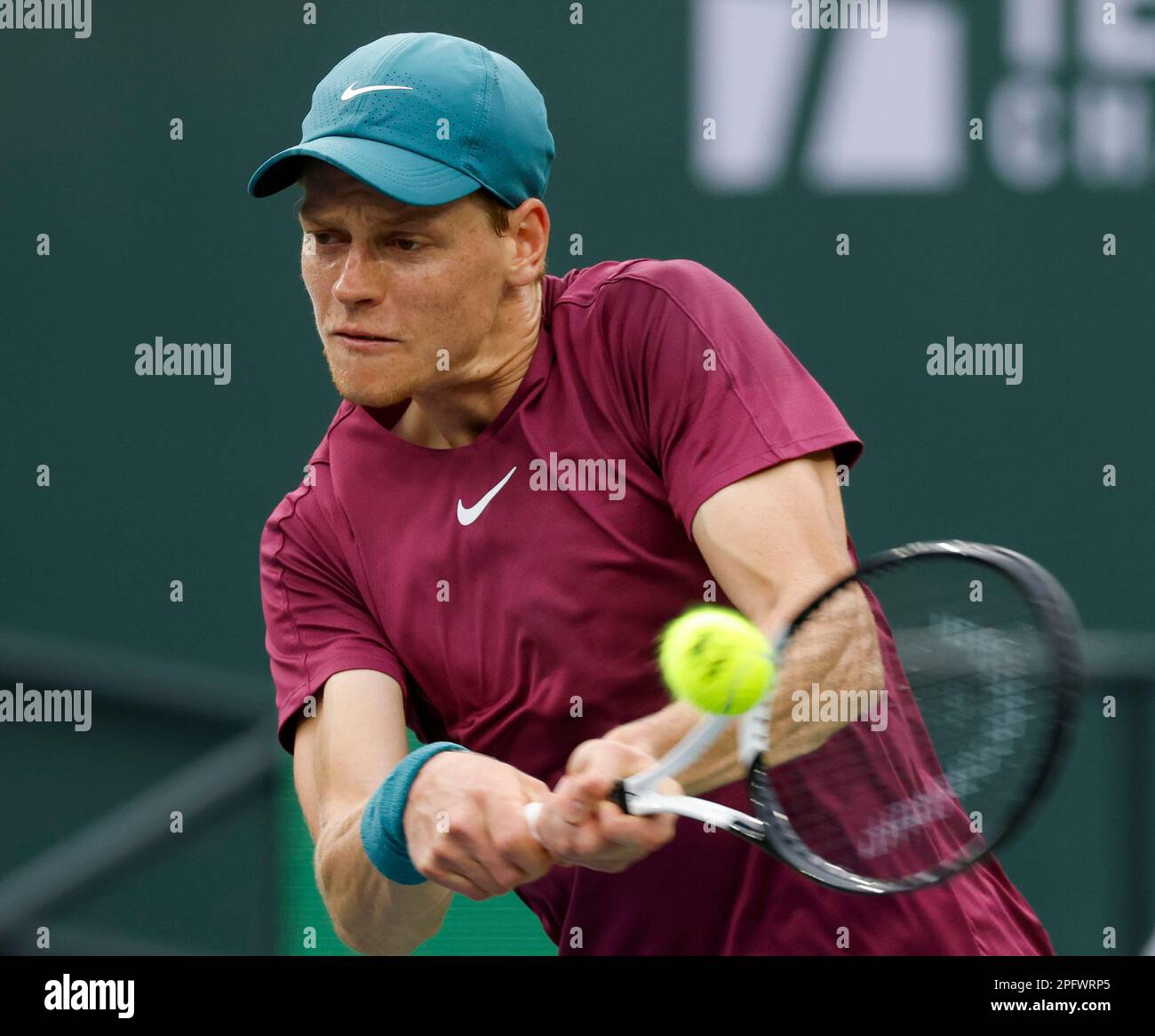March 18, 2023 Jannik Sinner of Italy returns a shot against Carlos Alcaraz of Spain during a semifinal match at the 2023 BNP Paribas Open at Indian Wells Tennis Garden in Indian