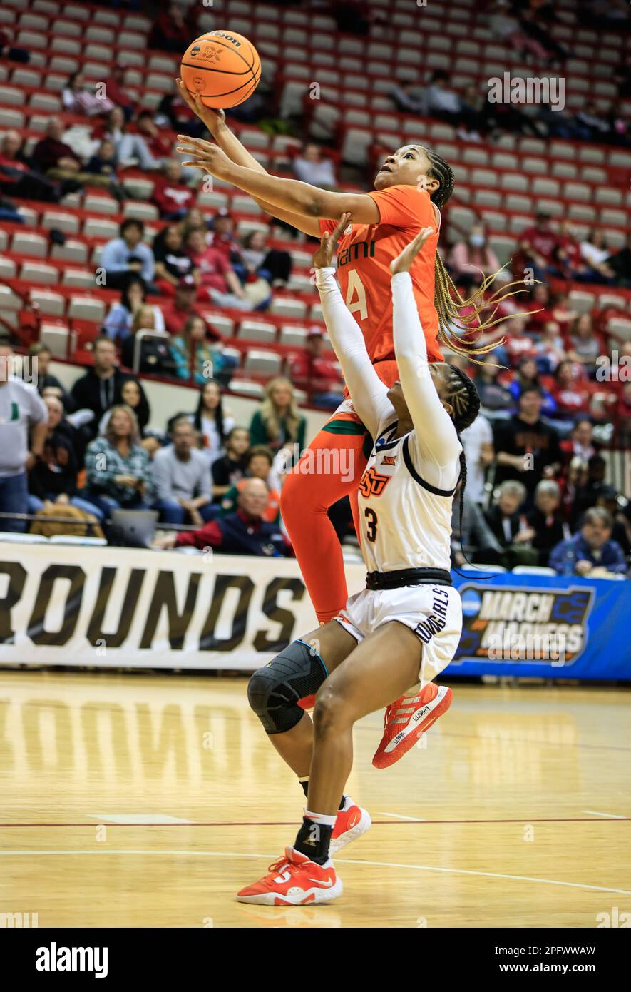 Bloomington, United States. 18th Mar, 2023. Miami Hurricanes guard Jasmyne Roberts (4) goes to the basket against Oklahoma State Cowgirls guard Naomie Alnatas (3) during an NCAA womenís basketball tournament game at Simon Skjodt Assembly Hall. Miami beat Oklahoma State 62-61. (Photo by Jeremy Hogan/SOPA Images/Sipa USA) Credit: Sipa USA/Alamy Live News Stock Photo