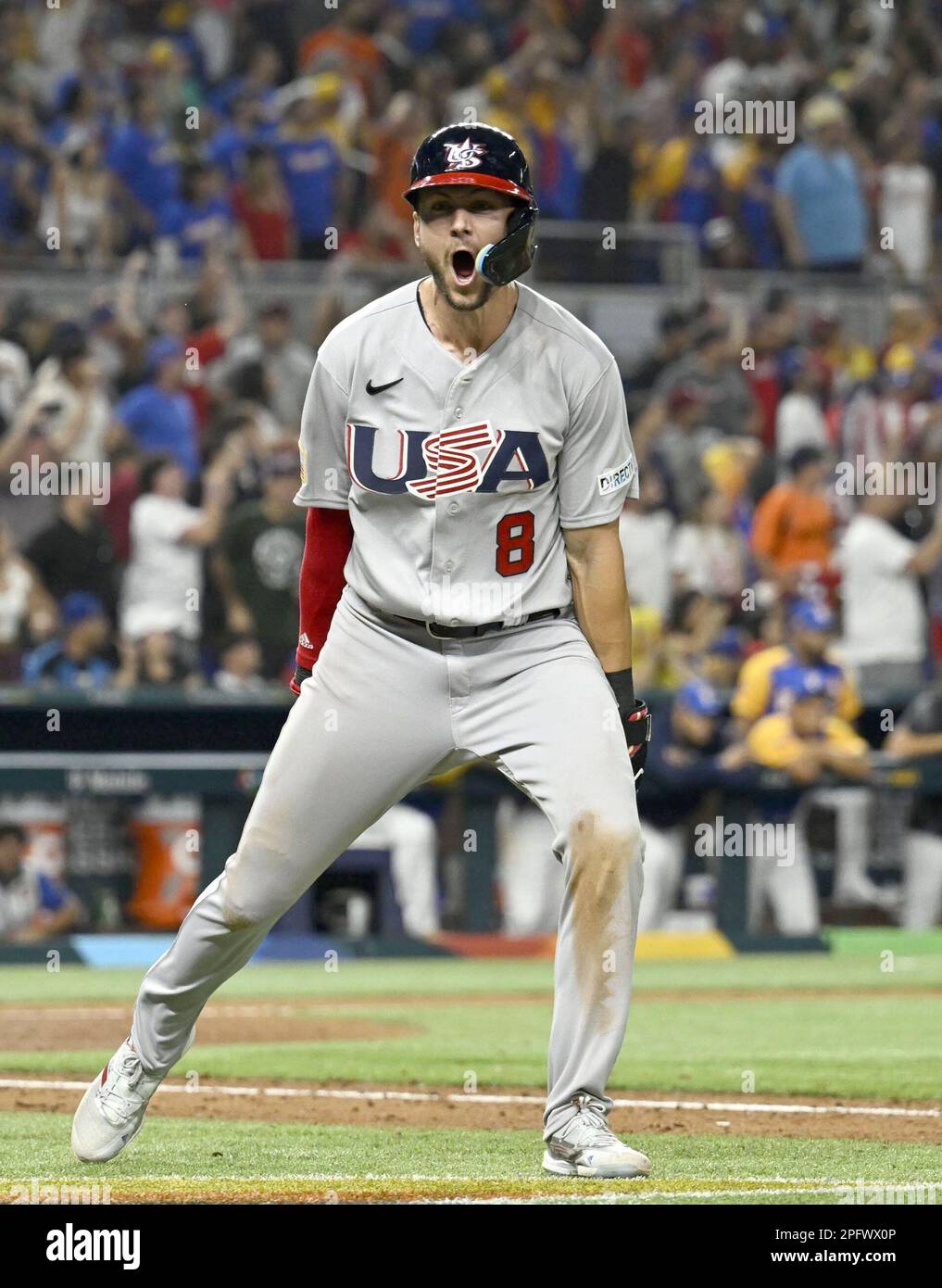 Trea Turner reacts after hitting a grand slam in the eighth inning of the  United States' World Baseball Classic quarterfinal game against Venezuela  at LoanDepot Park in Miami, Florida, on March 18