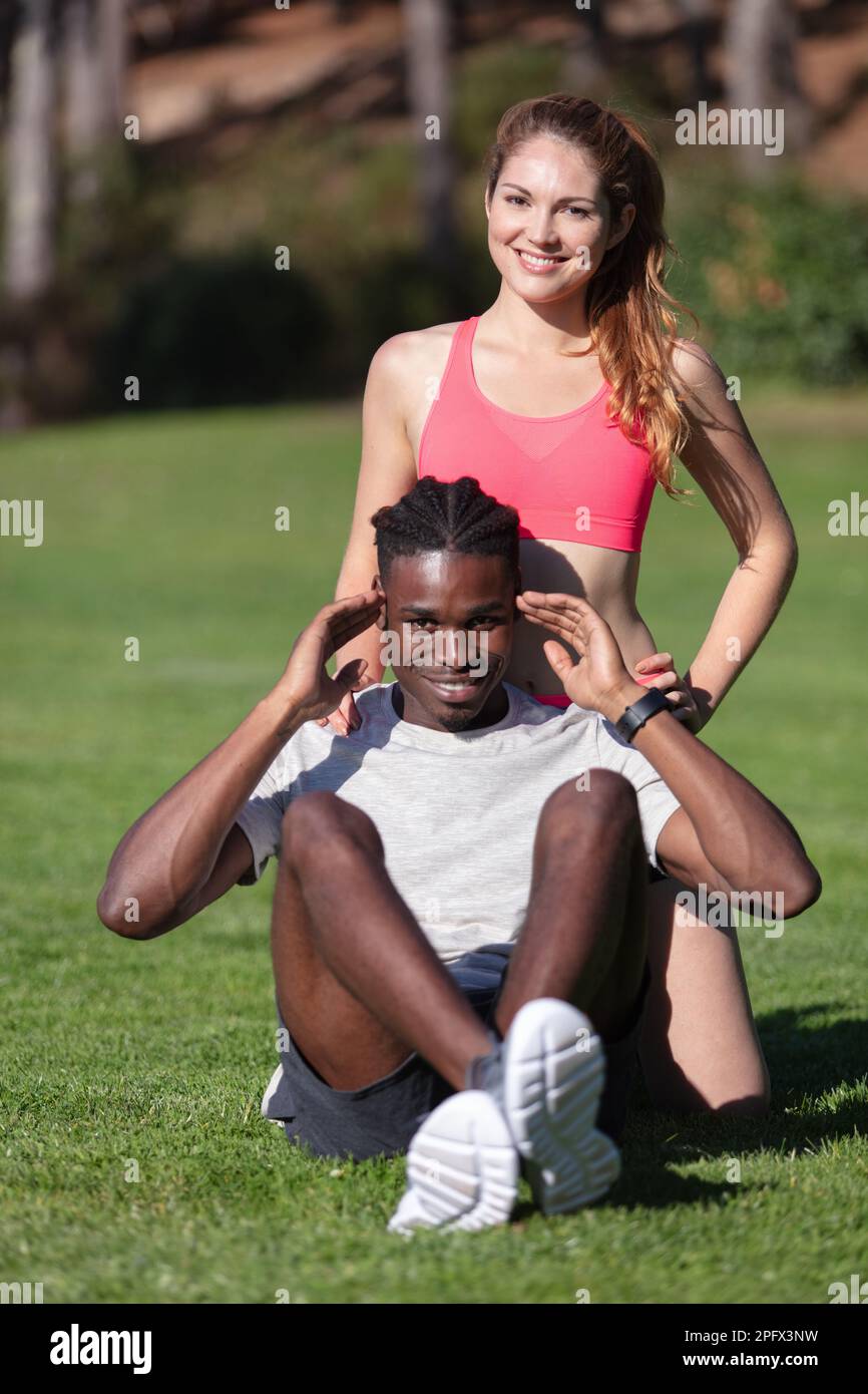 active diverse group doing sport outdoors Stock Photo