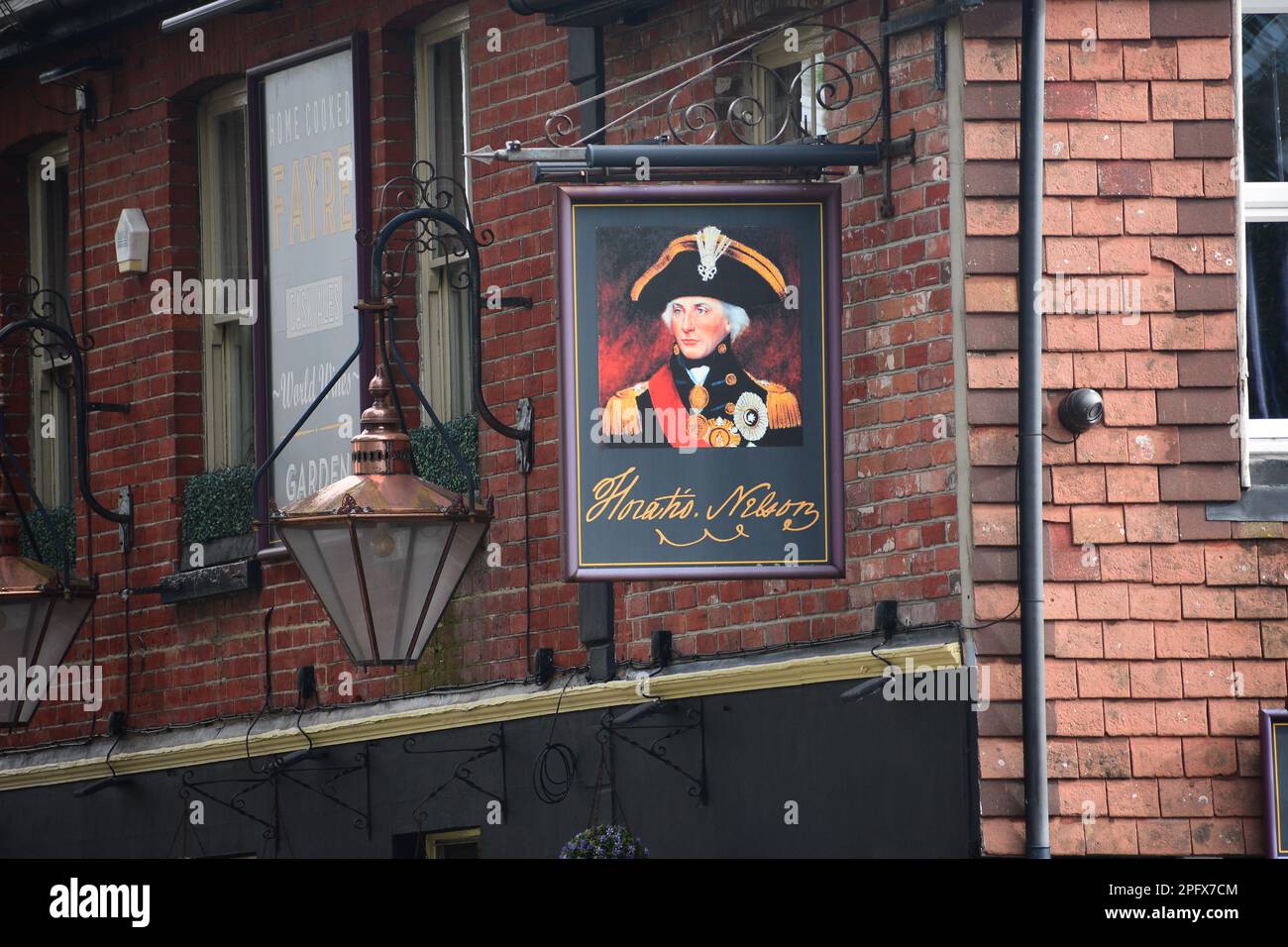 Horatio Nelson pub sign with brass hanging street light Stock Photo