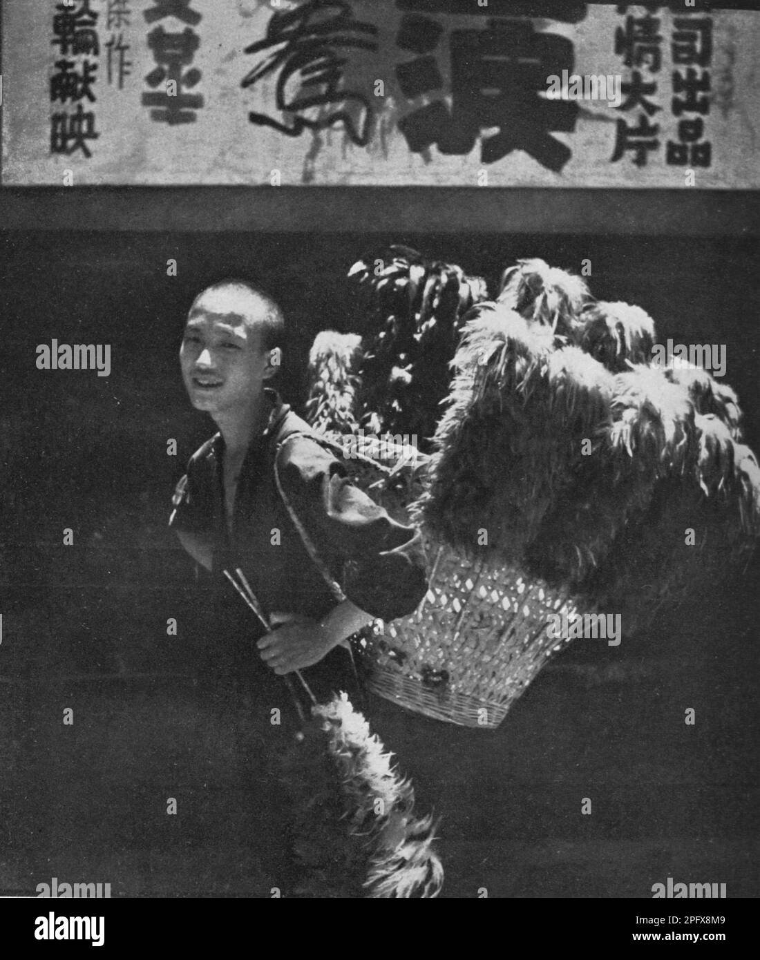 A man selling feather duster, photo by Cecil Beaton Stock Photo Alamy