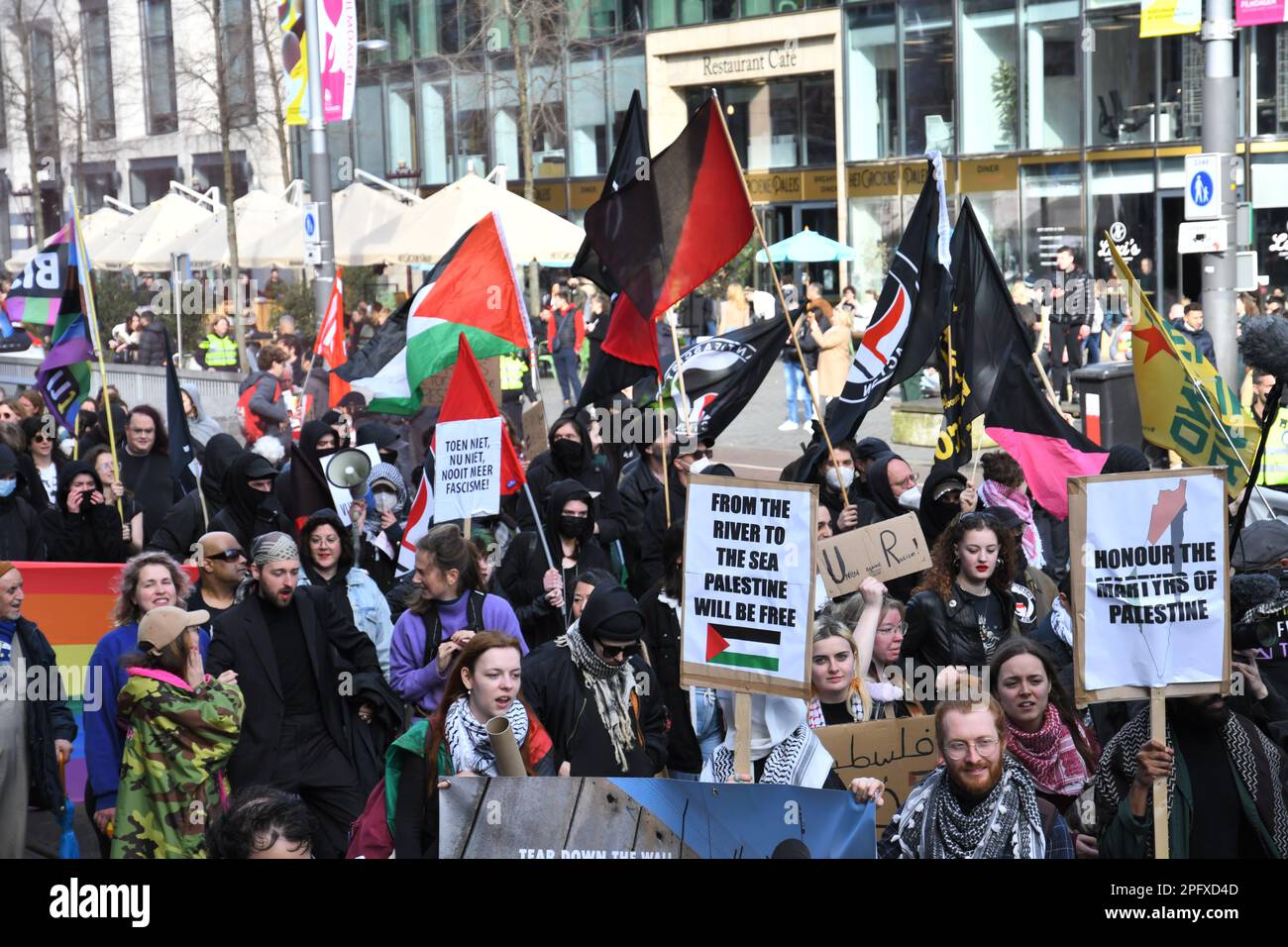 Amsterdam,the Netherlands 18th March,2023.The March 21 Committee organized the annual demonstration/manifestation in the context of the 'International Day Against Racism and Discrimination'.A large group marched from Dam-square to the 'Dokwerker'statue. Stock Photo