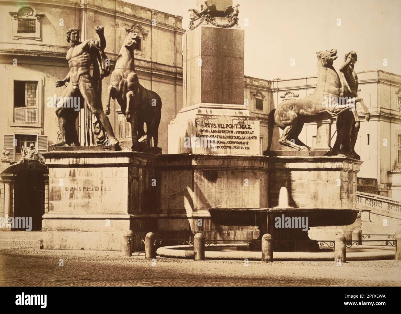 Dioscuri Statues, the Horse Tamers or Castor and Pollux, and Roman Obelisk of Quirinale, on Piazza del Quirinale, Quirinal Hill, Rome Italy. Vintage Black and White or Sepia Photograph c1855 by Tommaso Cuccioni Stock Photo