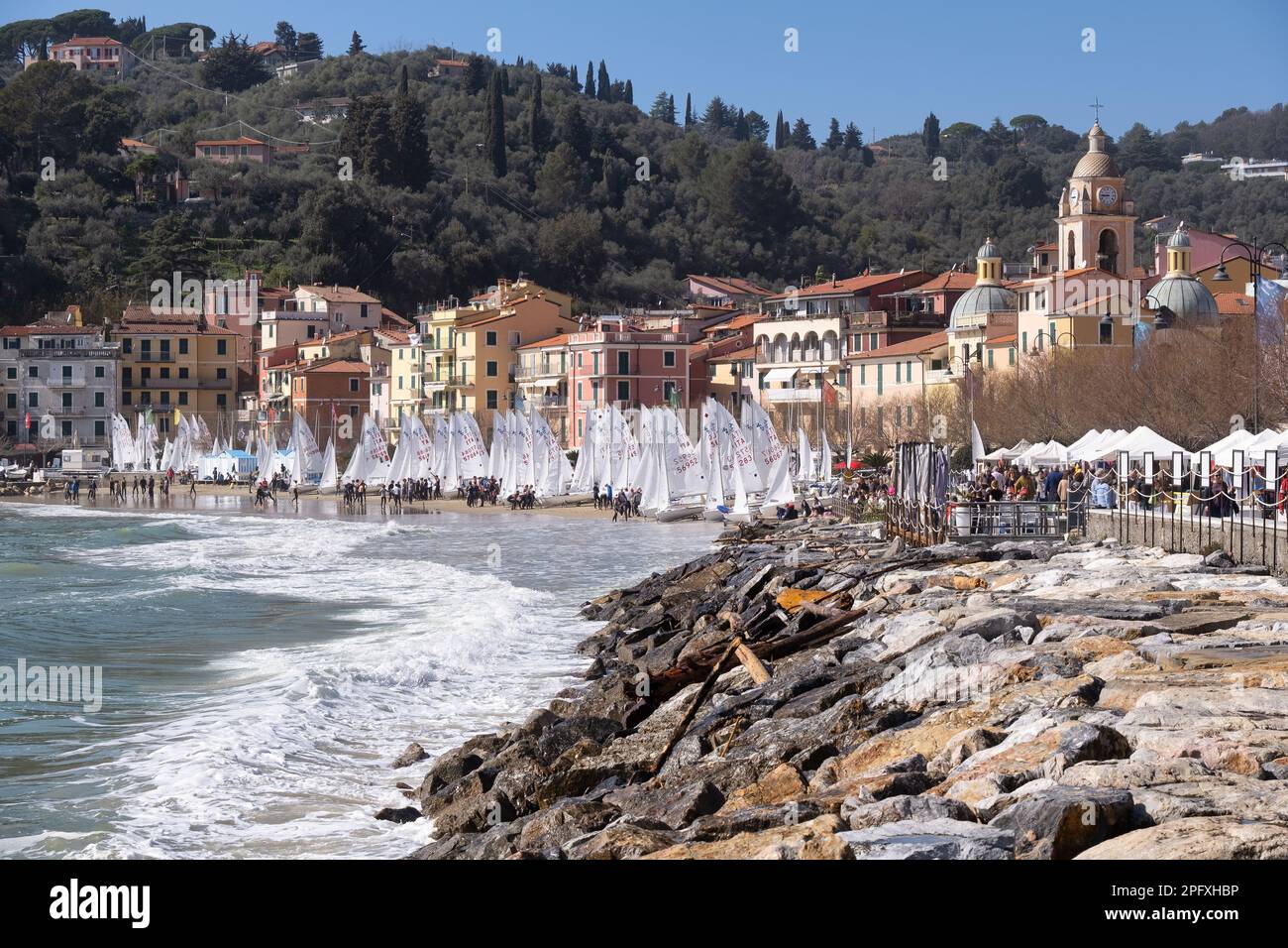 SAN TERENZO, LERICI, ITALY - MARCH 10, 2023: San Terenzo beach, crowded with sailboats before the regatta in spring. Lerici, in the Gulf of La Spezia, Stock Photo