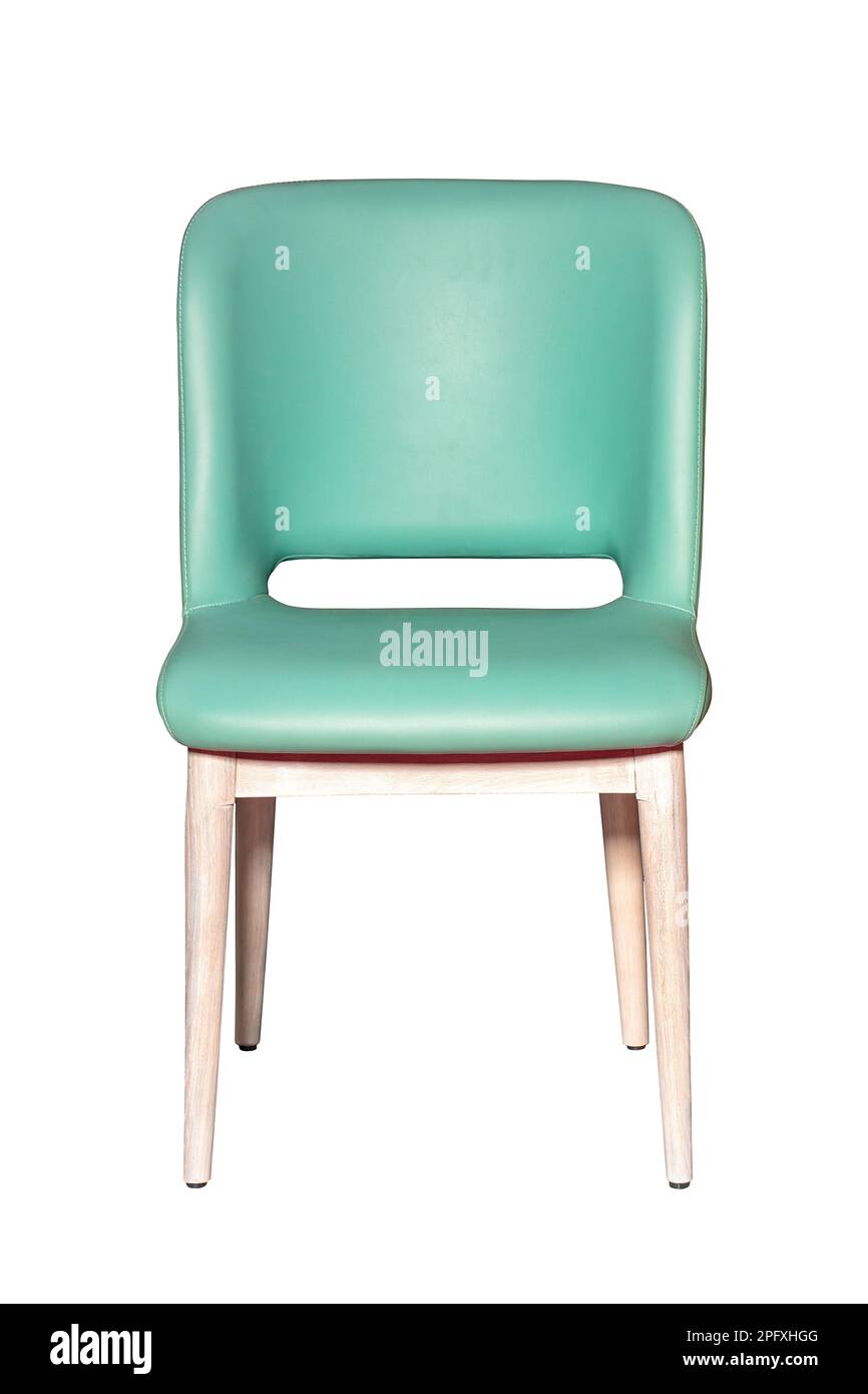 Dining chair with light wood legs and solid leather seat and light green top. The image is isolated on a white background. Stock Photo