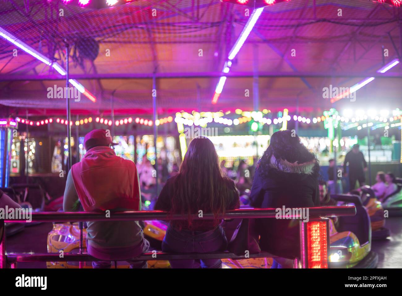 People waiting their turn at fair attraction Stock Photo - Alamy