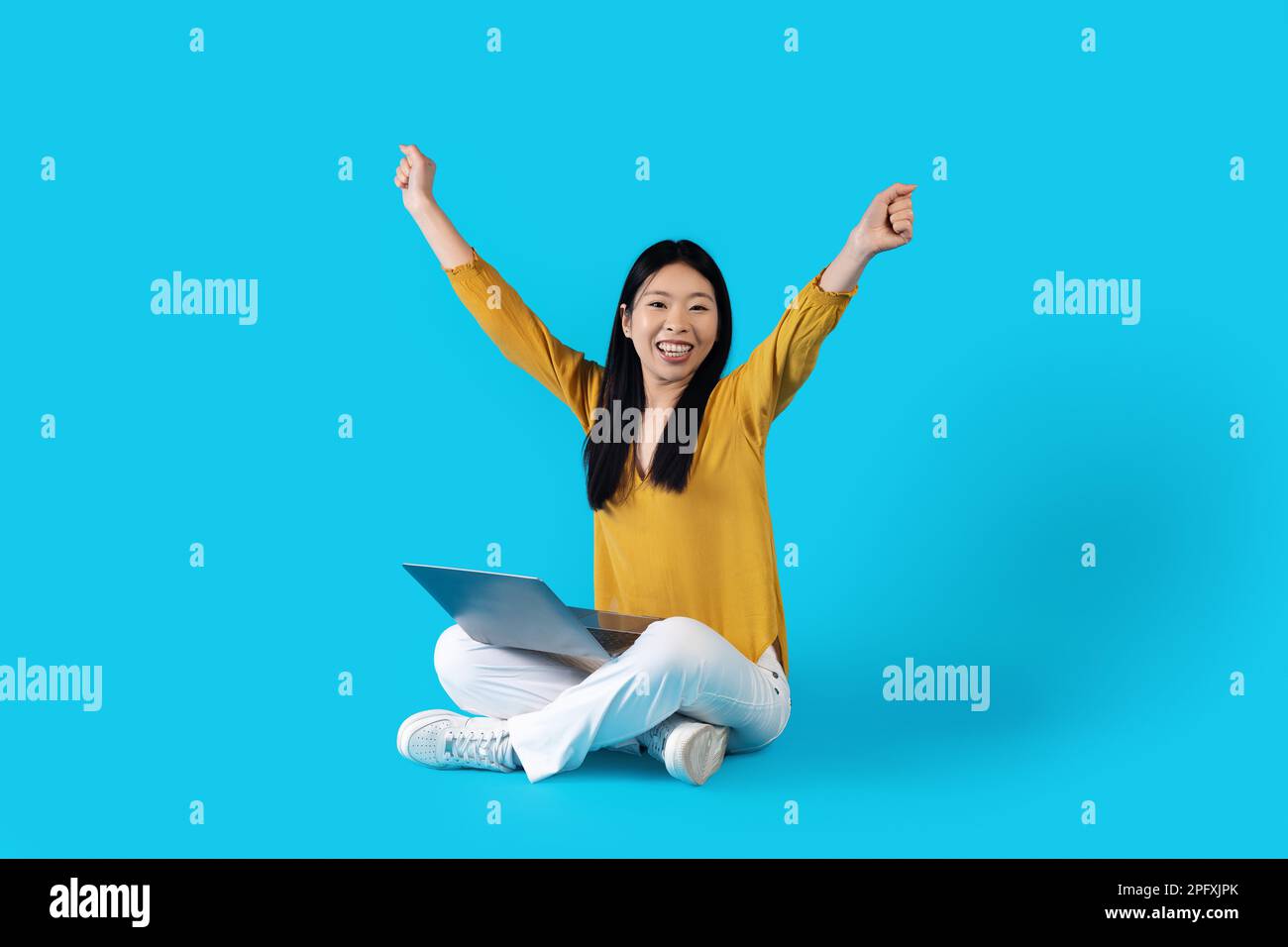 Positive japanese woman freelancer working from home, using gadgets Stock  Photo by Prostock-studio