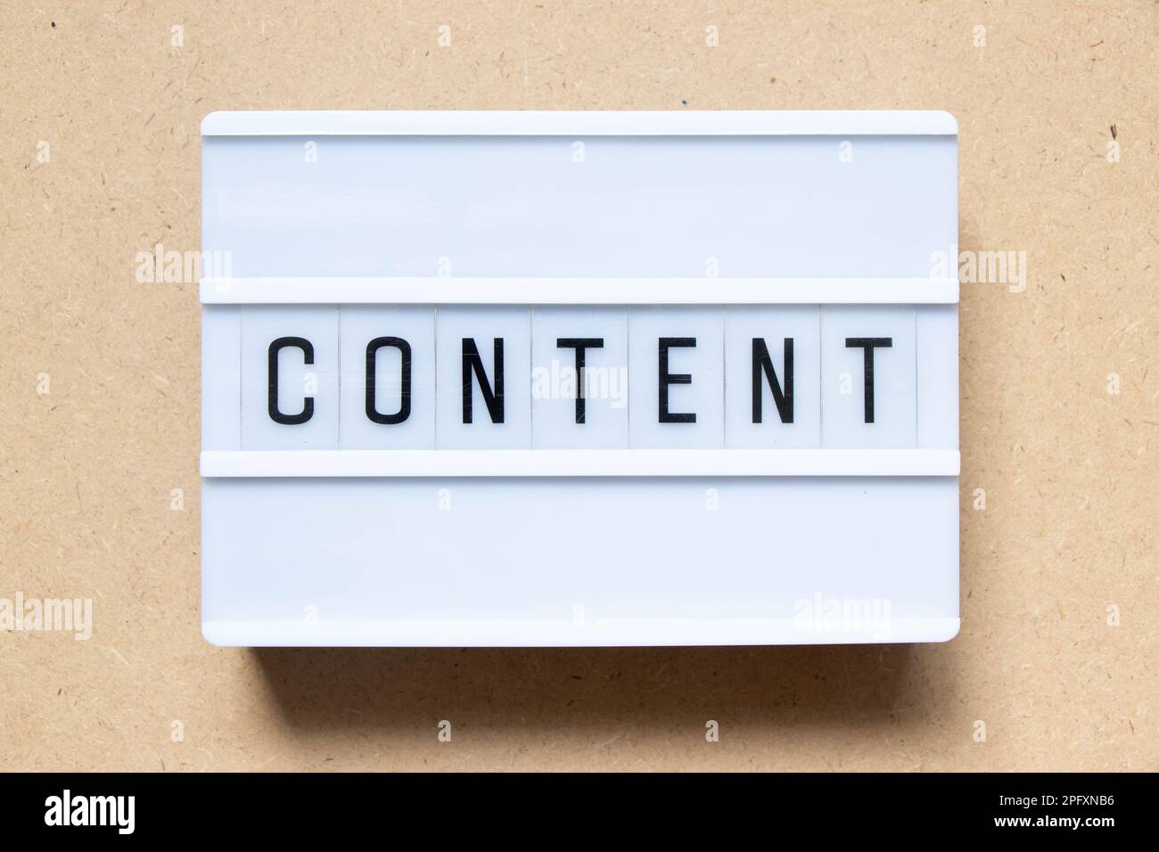 Lightbox with word content on wood background Stock Photo