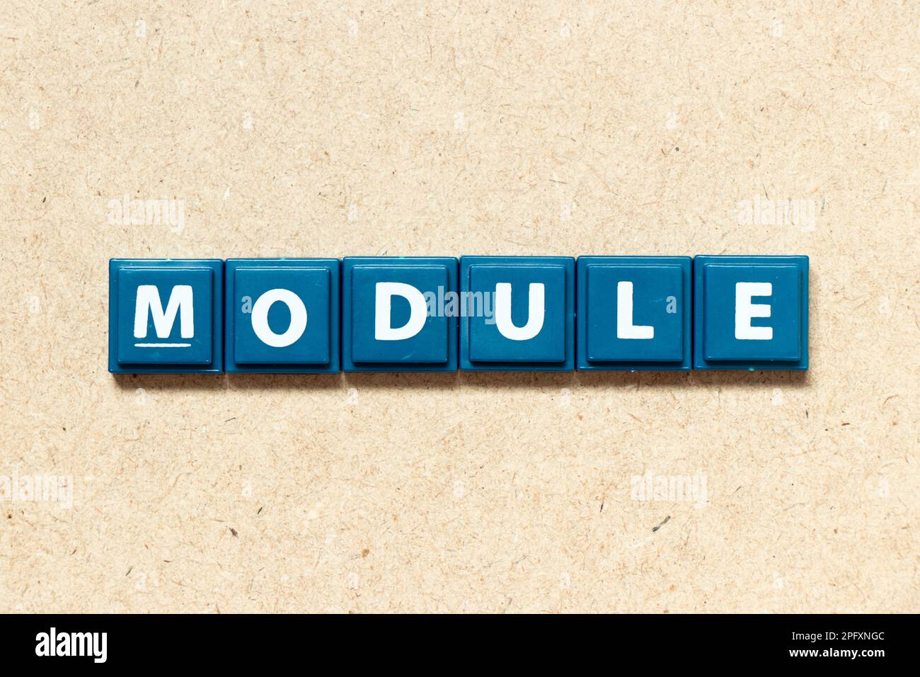 Tile alphabet letter in word module on wood background Stock Photo - Alamy