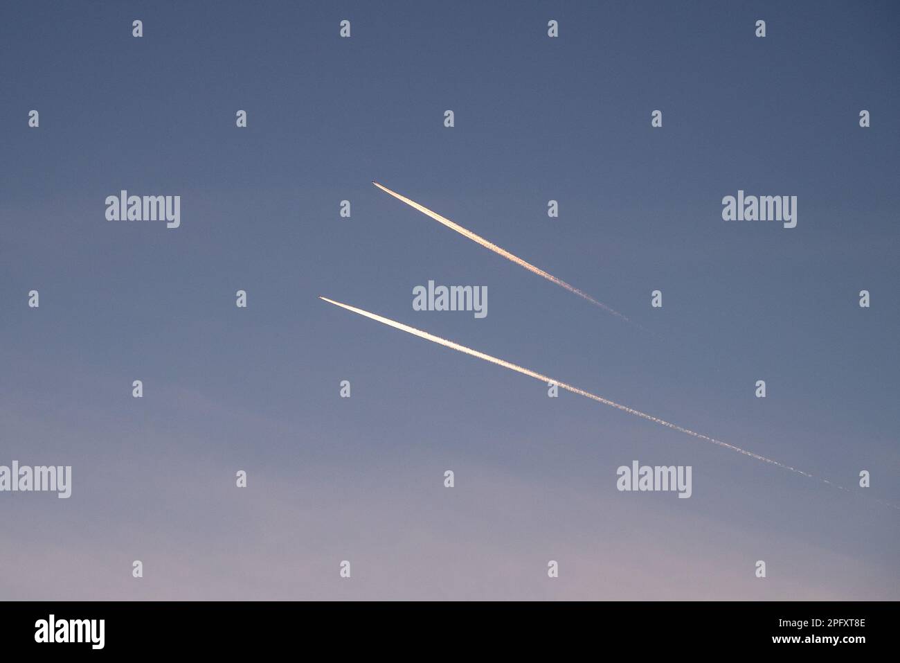 At Sunset, Two Parallel Airplane Tracks In Sky Over Island Of Corfu ...