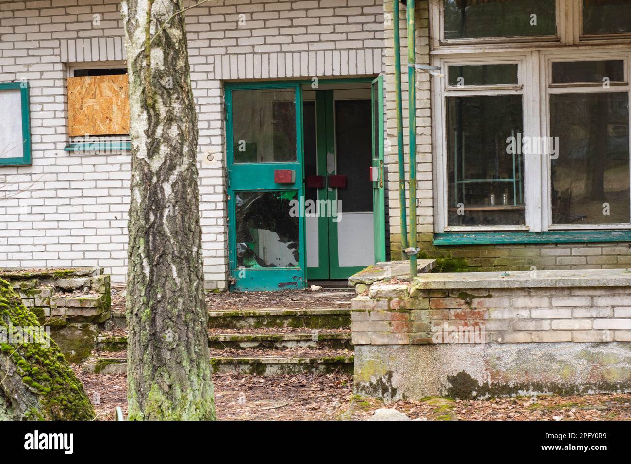 Entrance to an old, ruined and abandoned building Stock Photo - Alamy