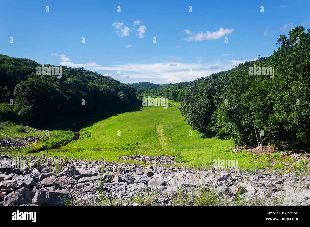 Atop a dam looking down at the flood zone at the east branch of the