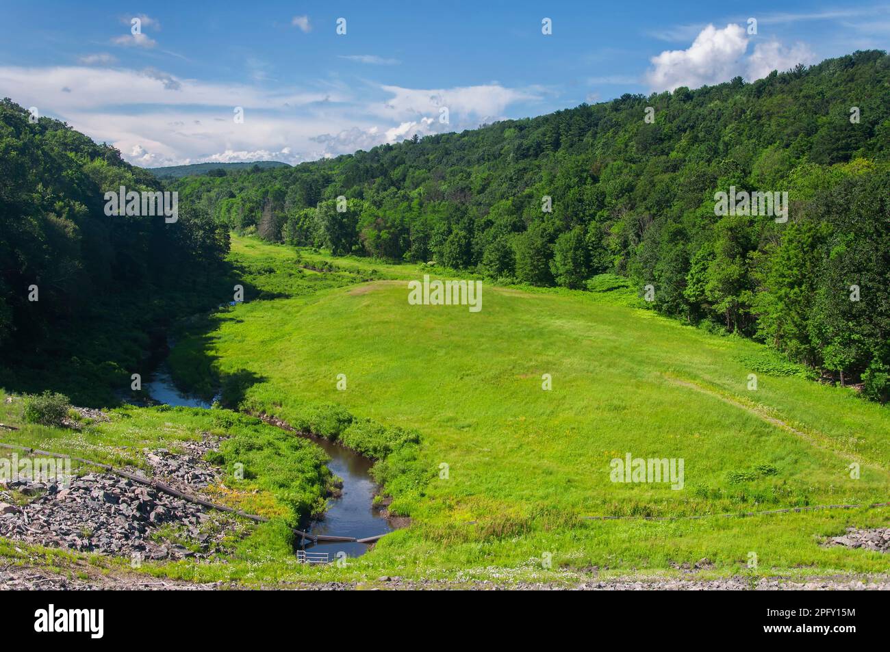 Atop a dam looking down at the flood zone at the east branch of the