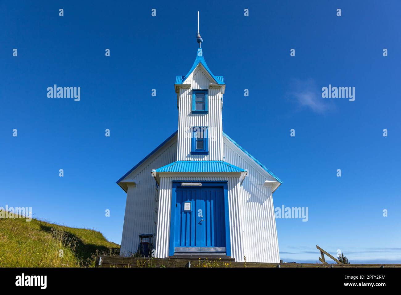 A small azure and blue church in the Stodvarfjordur Stock Photo - Alamy