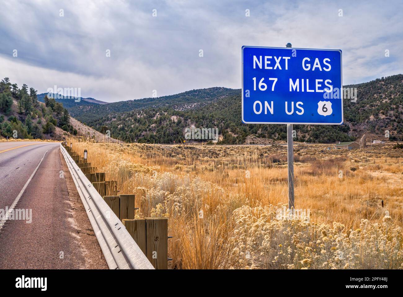 No gasoline available warning sign on Grand Army of the Republic Hwy (US 6), rabbitbush, Murry Canyon, Egan Range, near Ely, Nevada, USA Stock Photo