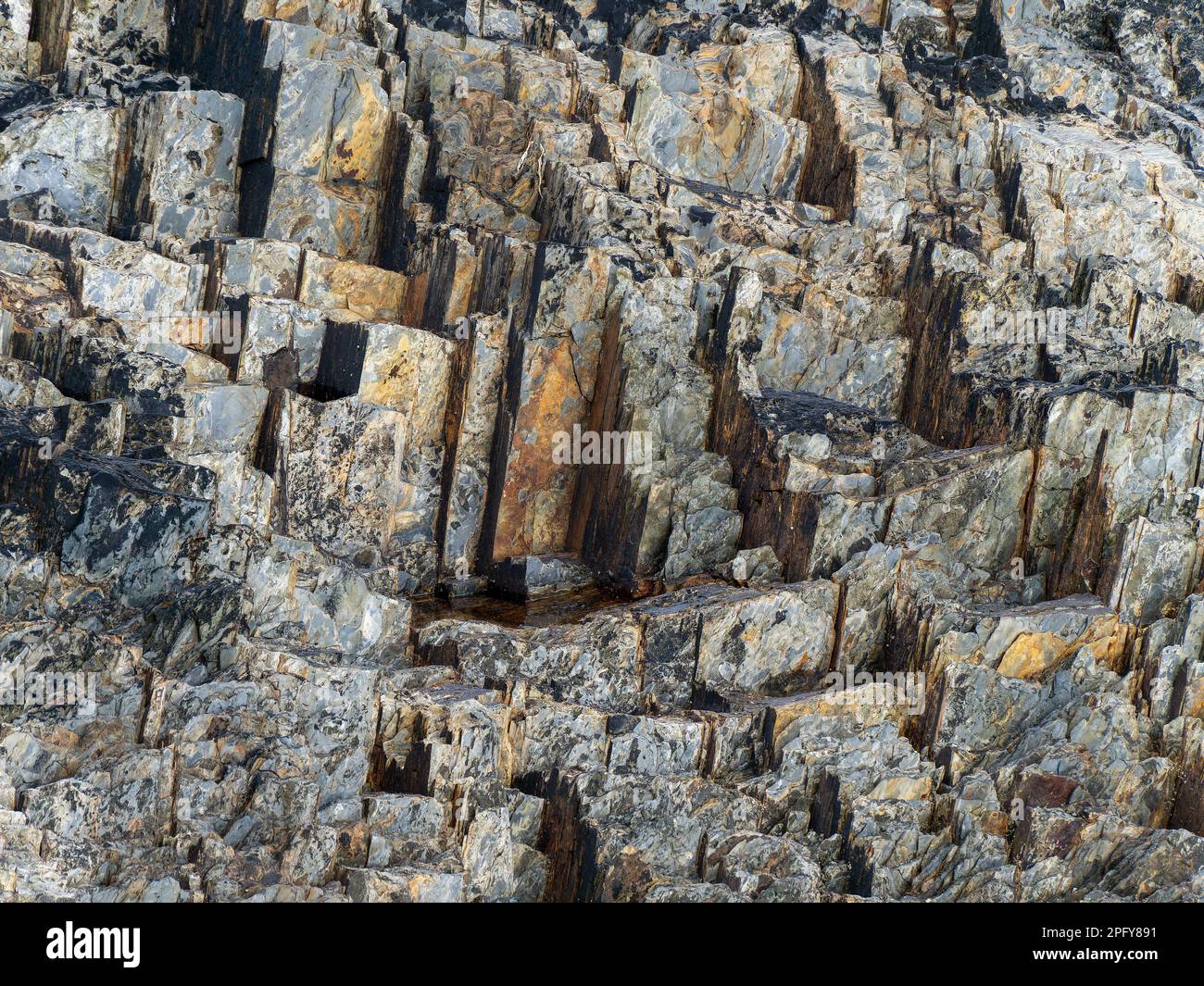 https://c8.alamy.com/comp/2PFY891/rock-pattern-stone-background-natural-rock-formation-layered-rock-on-a-background-2PFY891.jpg