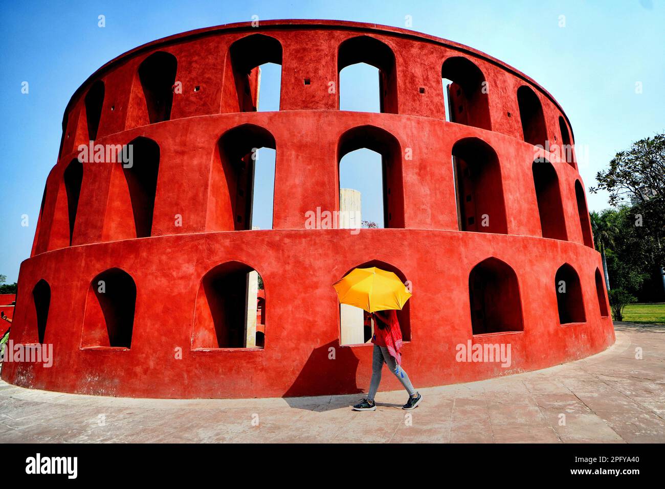 New Delhi India 27th Feb 2023 An Indian Visitor Walks With An Umbrella Inside A Structure At