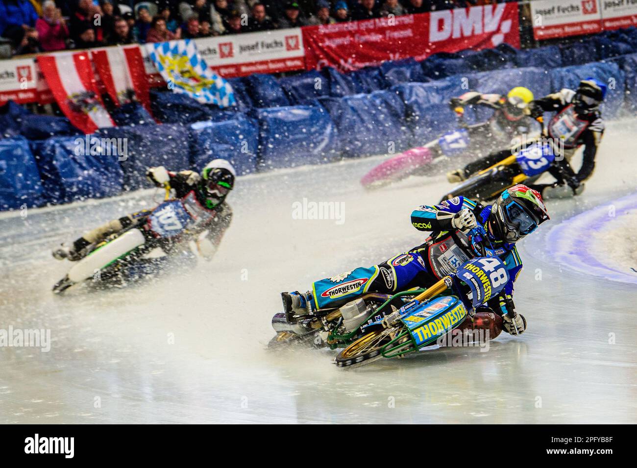 Inzell, Germany on Sunday 19th March 2023. Luca Bauer (48) (Red) leads Andrej Divis (107) (White) Franz Mayerbüchler (93) (Blue) and Benedikt Monn (17) (Yellow) during the Ice Speedway Gladiators World Championship Final 2 at Max-Aicher-Arena, Inzell, Germany on Sunday 19th March 2023. (Photo: Ian Charles | MI News) Credit: MI News & Sport /Alamy Live News Stock Photo