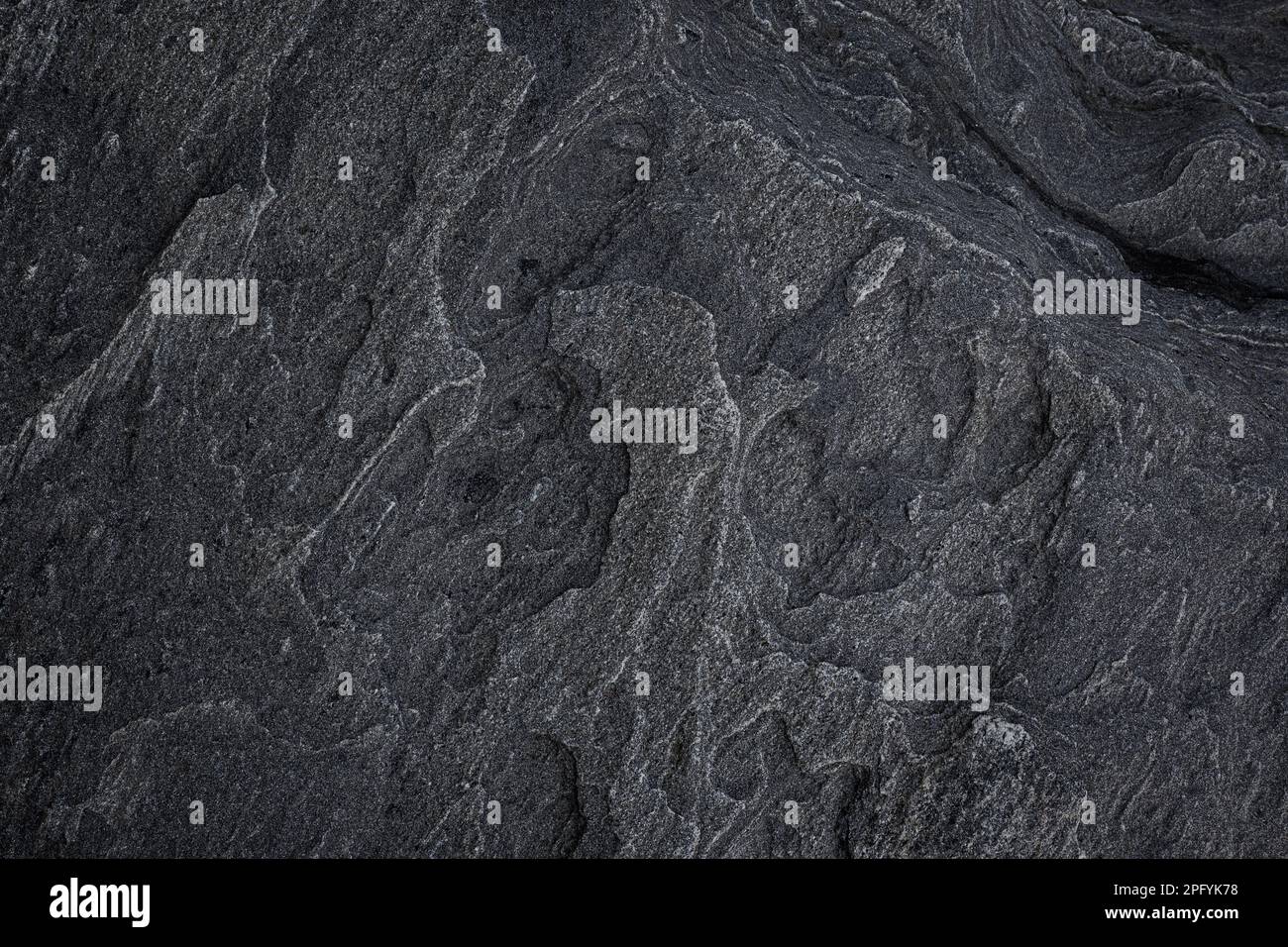 Close-up of a unique and beautiful rock surface, front view. Abstract ...