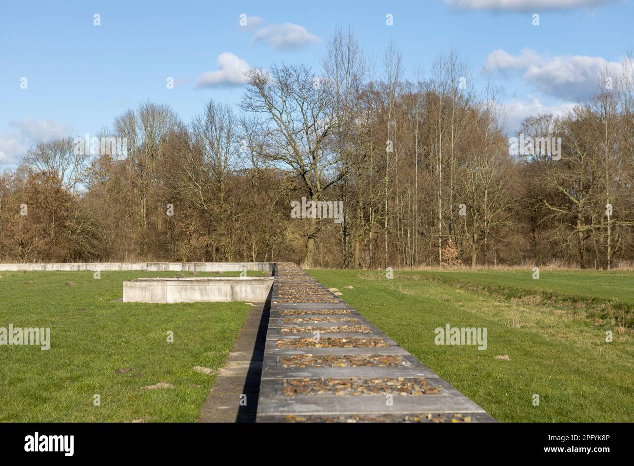 Top of curved demarcation of historic Roman wall remains with original