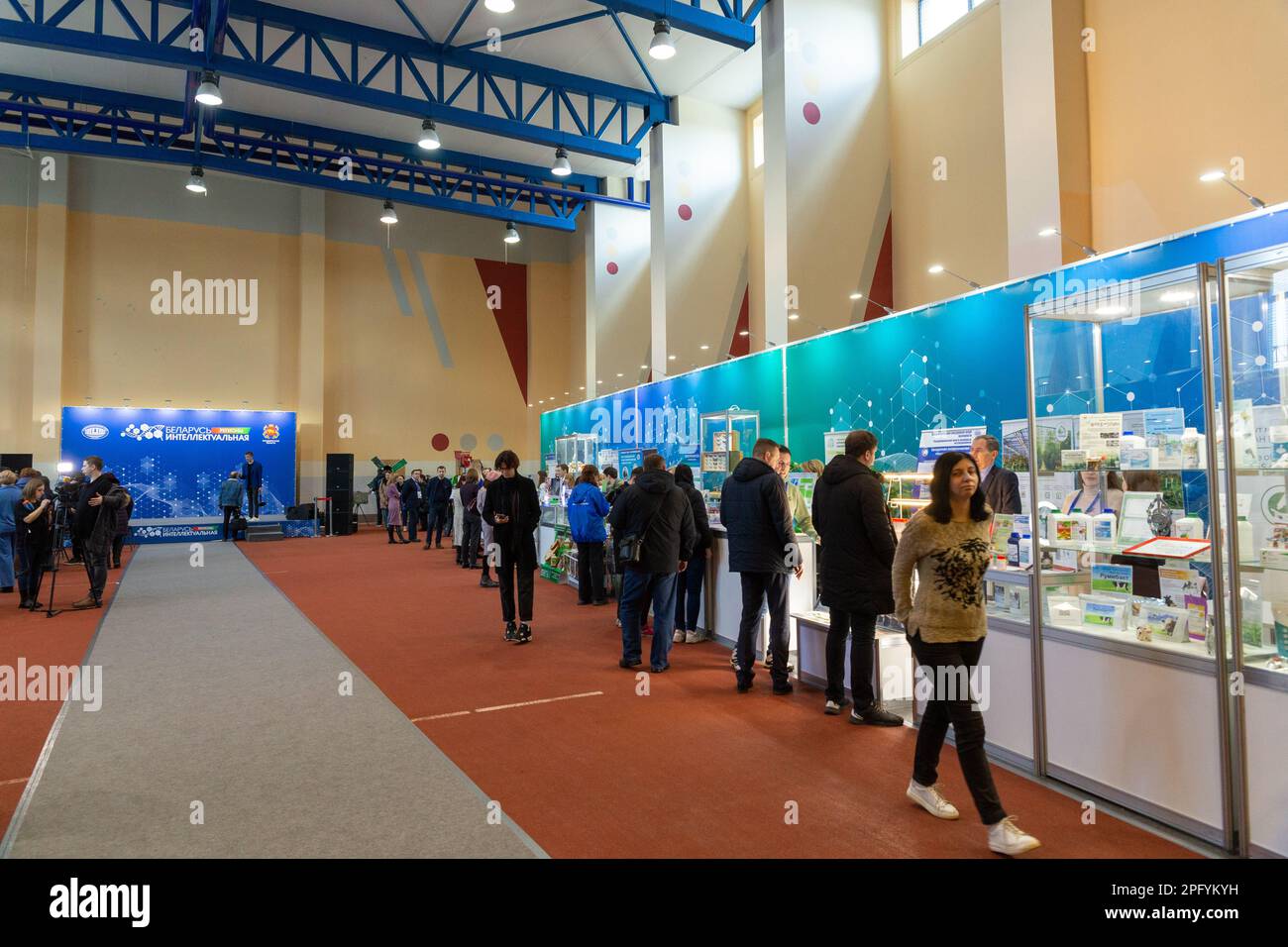 Grodno, Belarus - March 16, 2023: People get acquainted with the exposition of the Exhibition of scientific and technical achievements Belarus Intelle Stock Photo