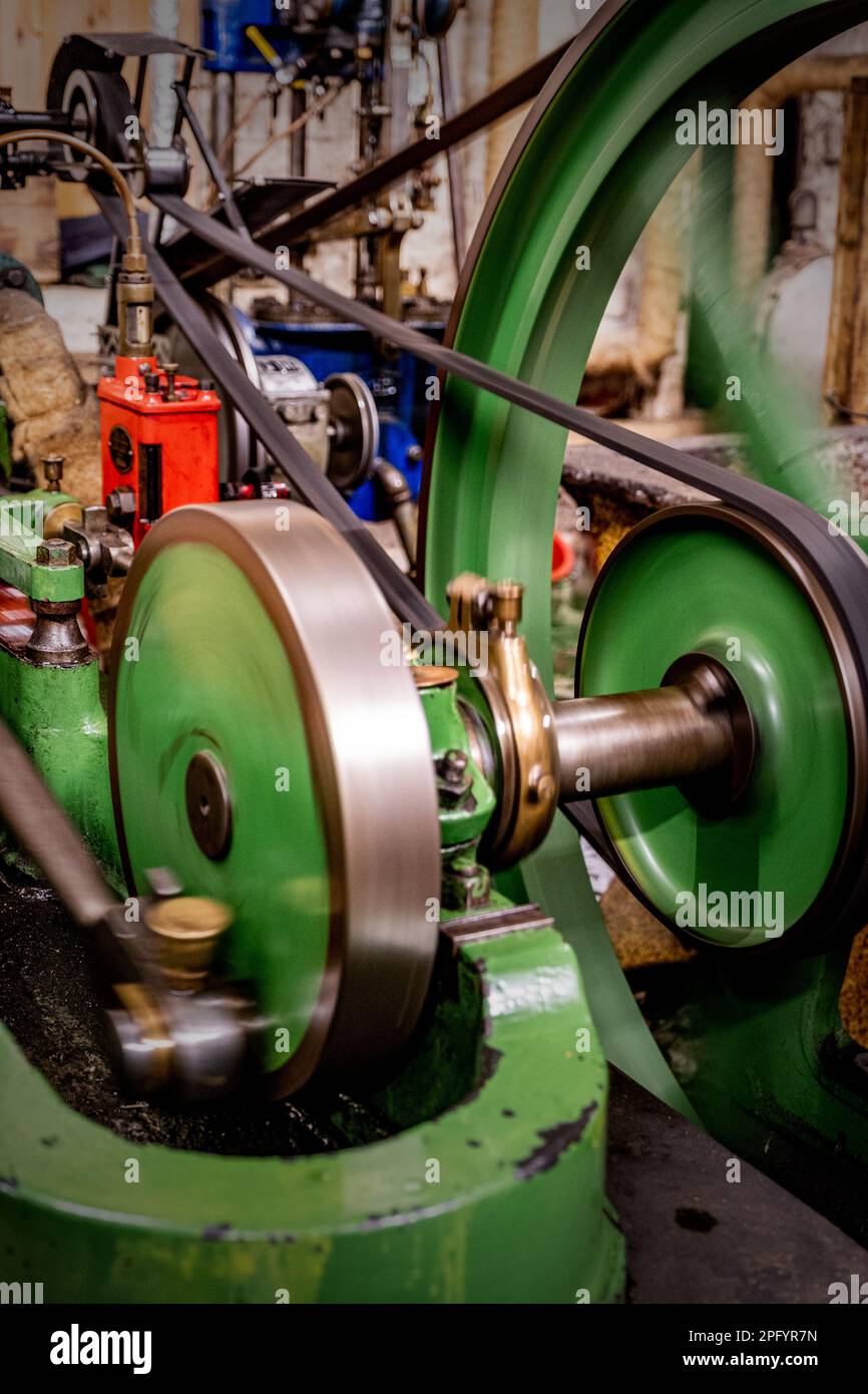 Steam powered, belt driven machinery at Combe Mill nr Woodstock, Oxford. Stock Photo