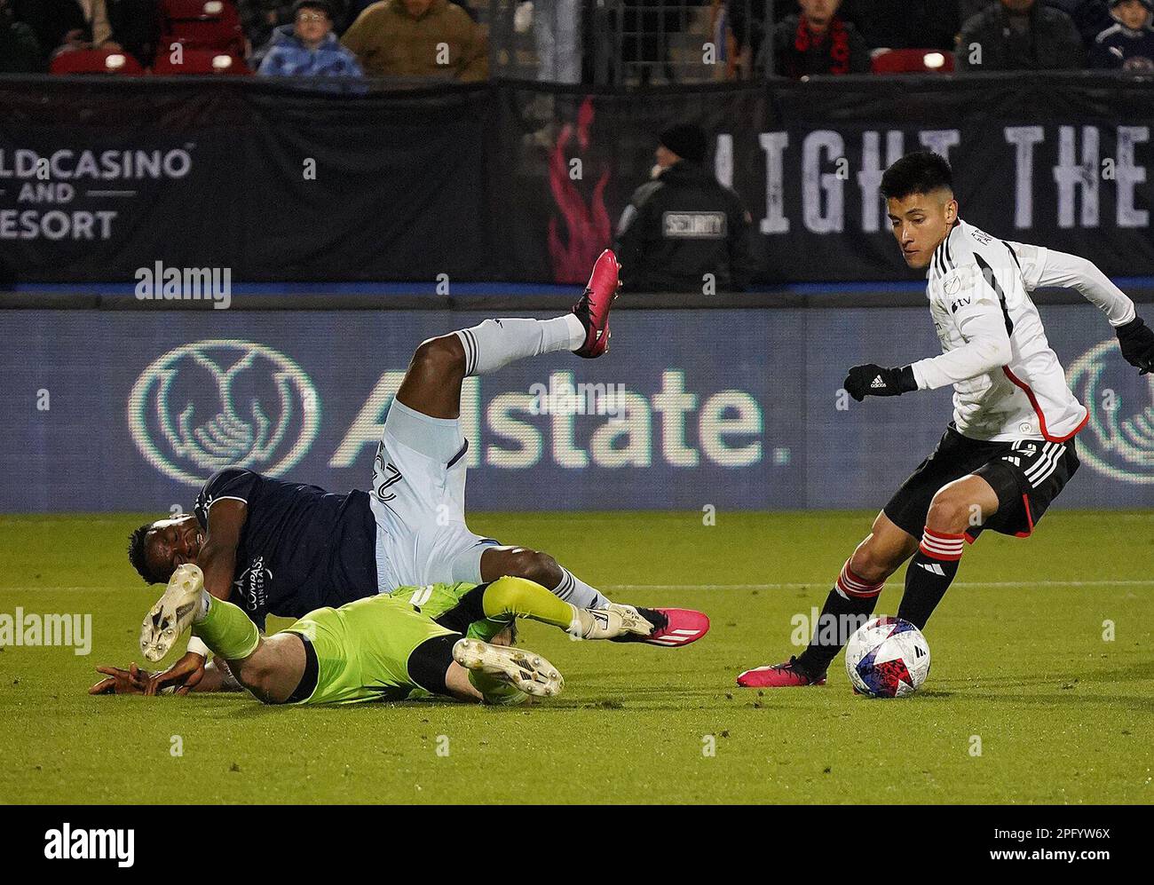 Frisco, United States. 18th Mar, 2023. March 18, 2023, Frisco, United States: Sporting KC forward Willy Agada falls on top of FC Dallas goalkeeper Maarten Paes during second half action of the MLS game between FC Dallas and Sporting KC at Toyota Stadium on March 18, 2023 in Frisco, Texas. (Photo by Javier Vicencio/ Credit: Eyepix Group/Alamy Live News Stock Photo