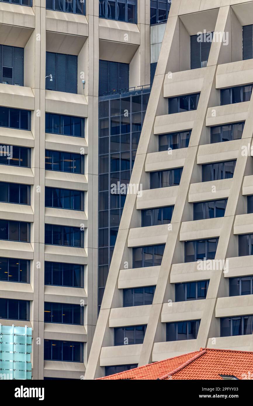 The sloping façade of 55 Water Street’s North Building crosses plane of ...