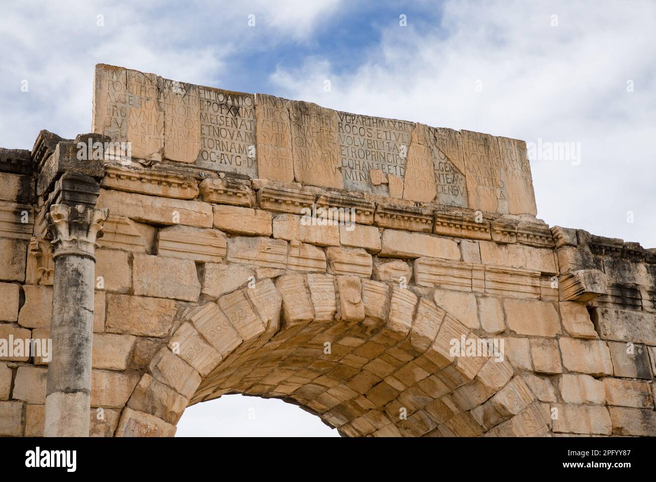 Roman Arch Inscription View of the inscription on the triumphal arch built in honor of the ...