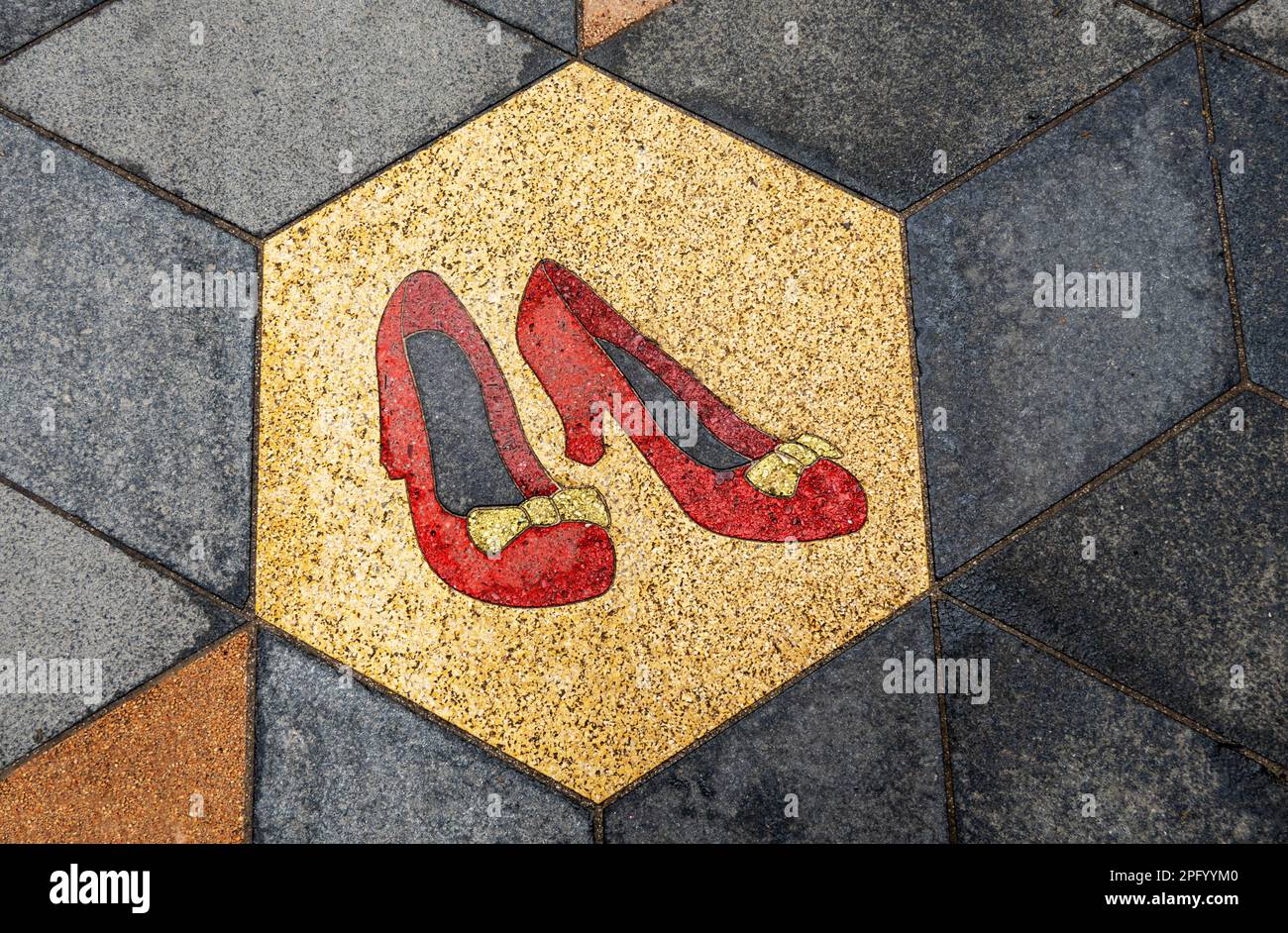 The Ruby Slippers, illustration on a walkway in Liverpool Stock Photo