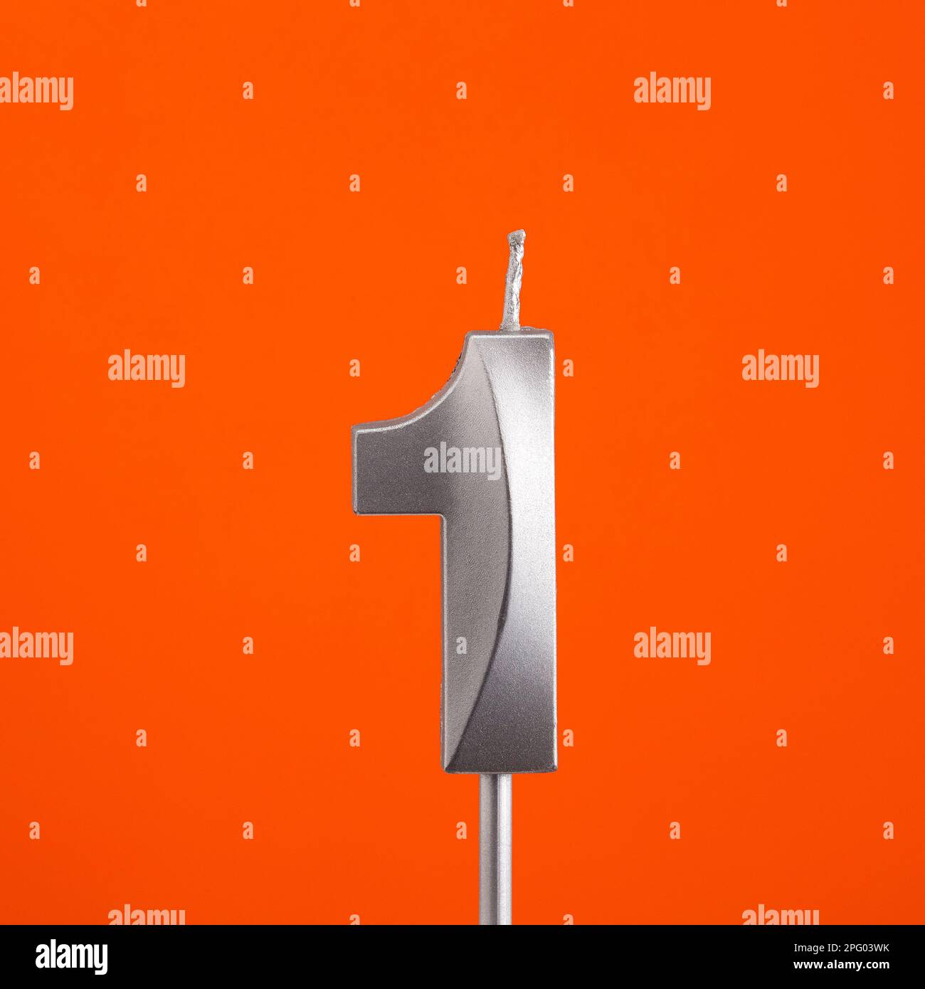 Number 1 candle - Birthday in orange background Stock Photo