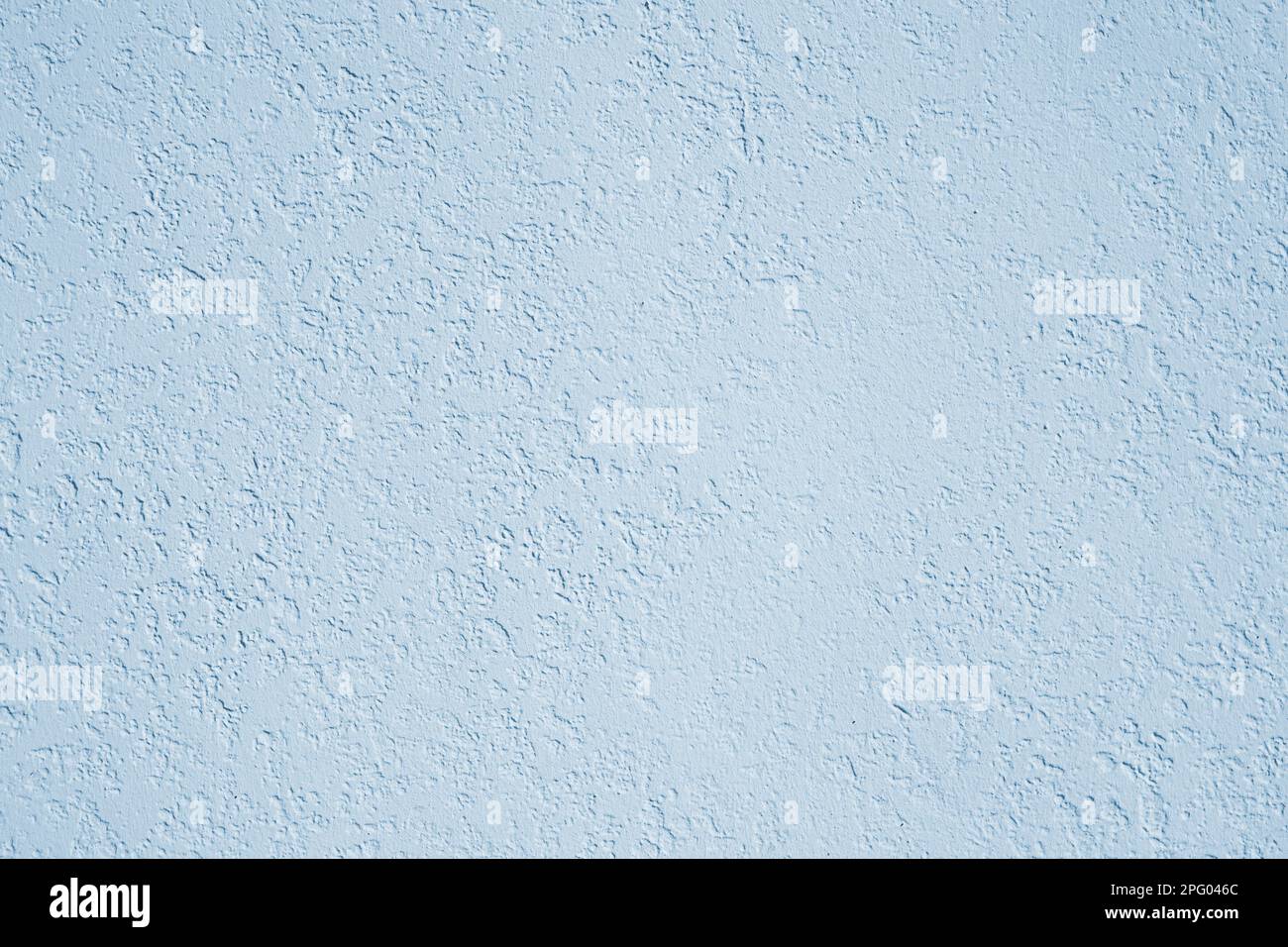 roughcast plaster wall background texture in light blue Stock Photo - Alamy