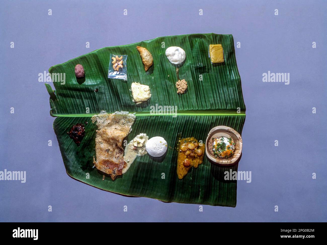 Cutout, Wedding vegetarian lunch on a banana leaf, Nattukottai Chettiar Nagarathar, Chettinad, Tamil Nadu, South India, India, Asia Stock Photo