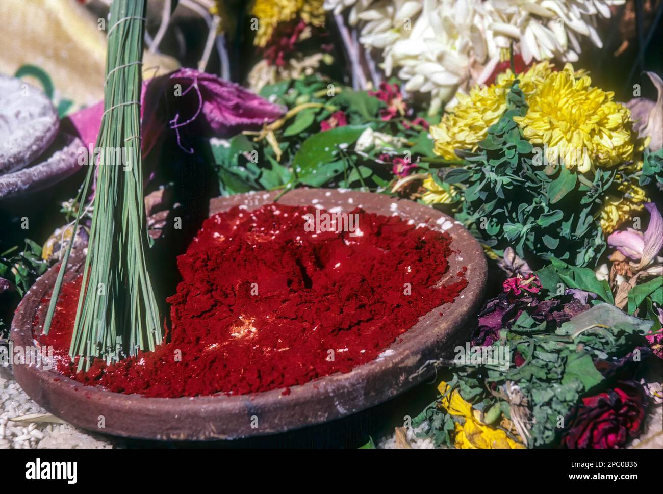 Kum kum and halfa grass (Desmostachya bipinnata) used for performing Pooja, Tamil Nadu, South Inida, Inida, Asia Stock Photo