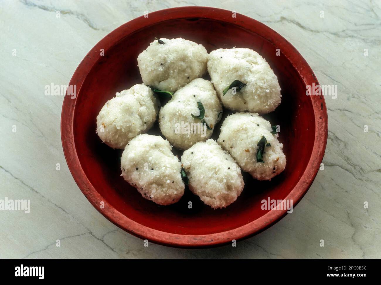 Kolakkattai steamed rough rice moulded in to ovular shape. Traditional