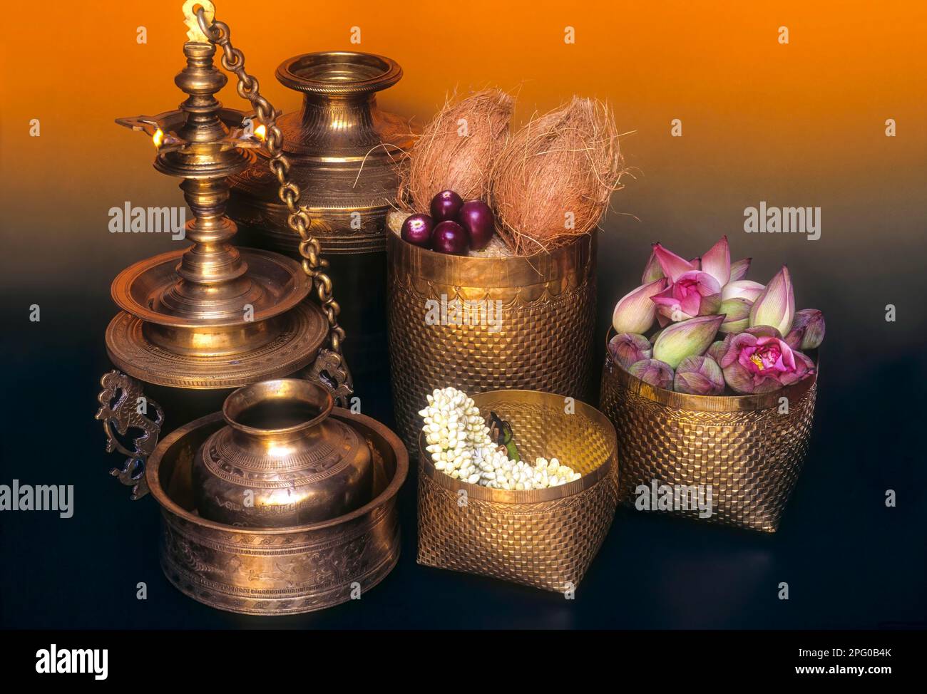Sacred brass oil lamps and replications of traditionally woven palm