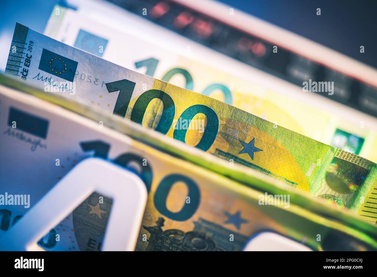 European Euro Banknotes Inside Counting Machine Close Up. Finance Industry Theme. Stock Photo
