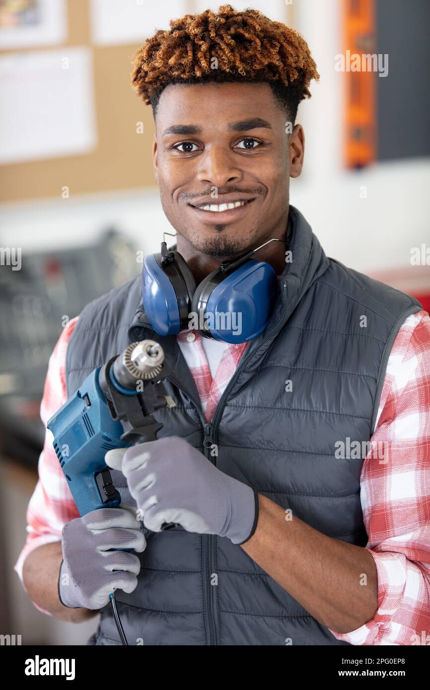 car mechanic with air hammer Stock Photo Alamy