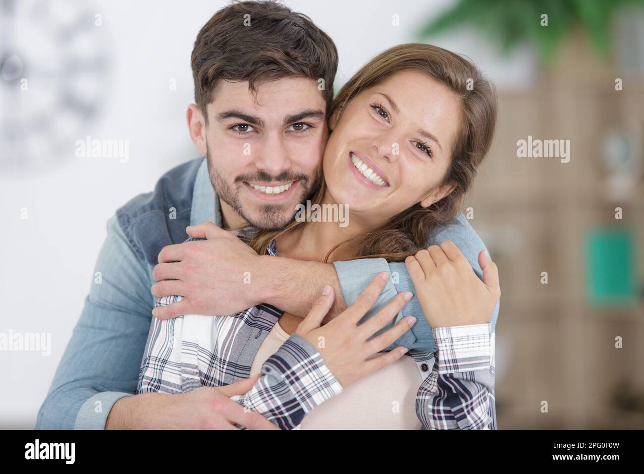 beautiful couple hugging in love Stock Photo - Alamy