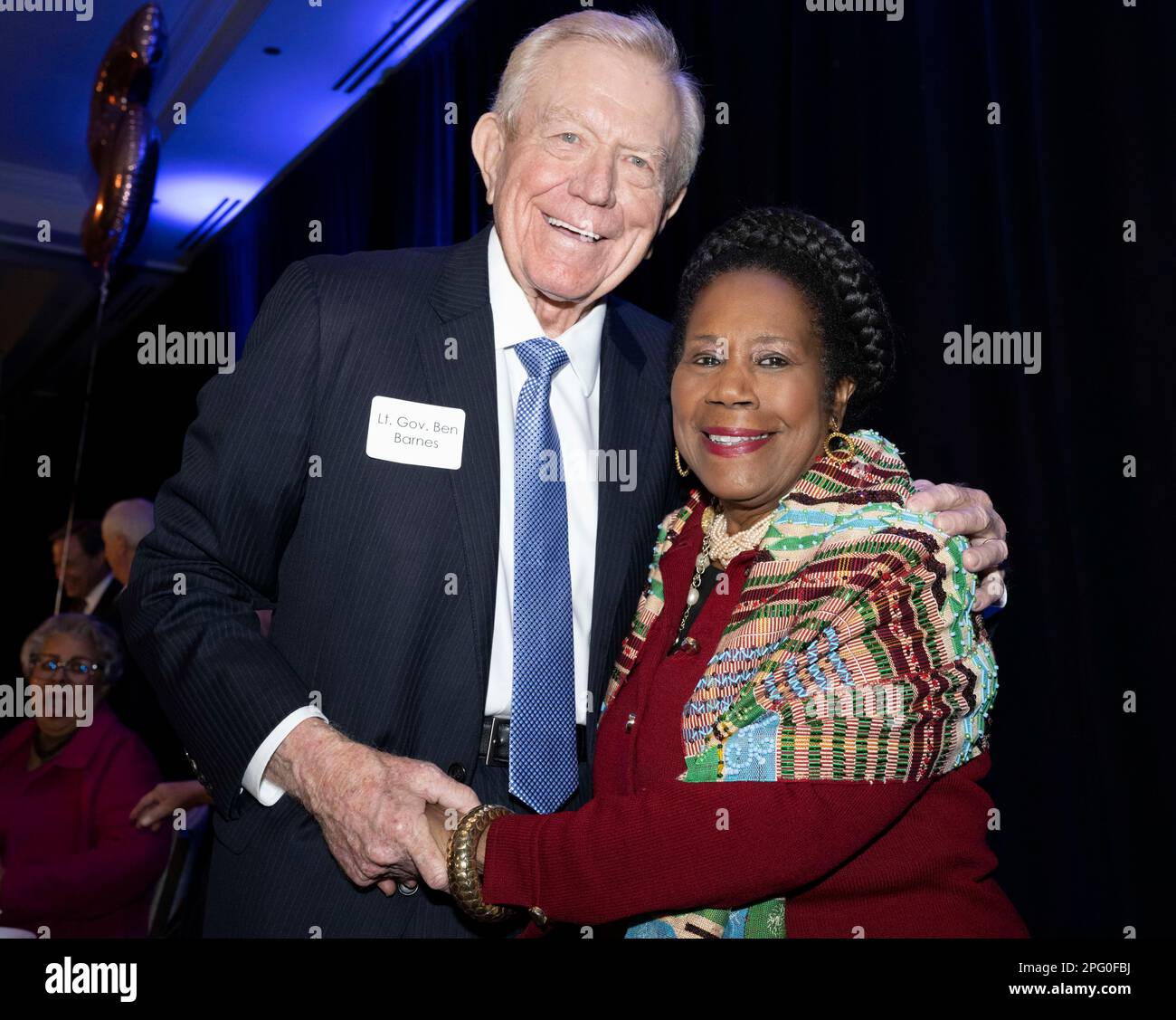 Former Texas Speaker of the House, BEN BARNES, shown with Congresswoman SHEILA JACKSON LEE  at a February 13, 2023 Austin political gathering, admitted in a New York Times article published this weekend of unwittingly working against the reelection of President Jimmy Carter in 1980.  Barnes and now deceased former Texas Governor John Connally traveled to the Middle East secretly lobbying to not release the Iran hostages until after Ronald Reagan's election victory. Stock Photo