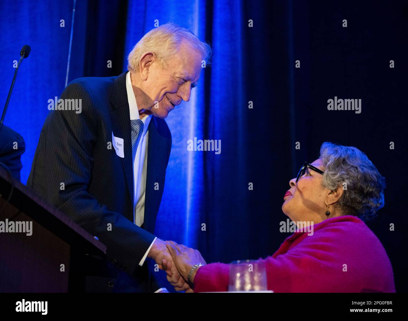 Former Texas Speaker of the House, BEN BARNES, shown with State Rep. SENFRONIA THOMPSON of Houston at a February 13, 2023 Austin political gathering, admitted in a New York Times article published this weekend of unwittingly working against the reelection of President Jimmy Carter in 1980.  Barnes and now deceased former Texas Governor John Connally traveled to the Middle East secretly lobbying to not release the Iran hostages until after Ronald Reagan's election victory. Stock Photo
