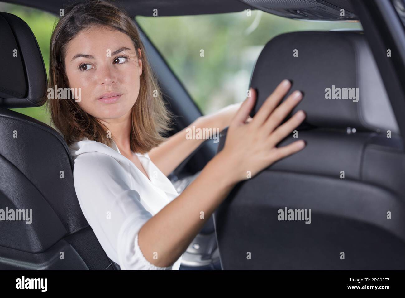 portrait of a young woman reversing Stock Photo Alamy