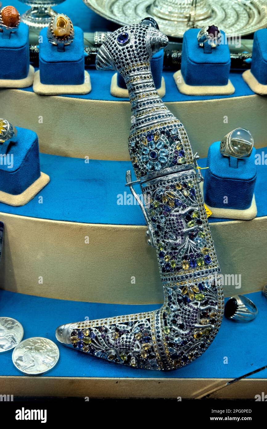 Traditional khanjar dagger for sale in the Mutrah Souq, Muscat, Oman Stock Photo