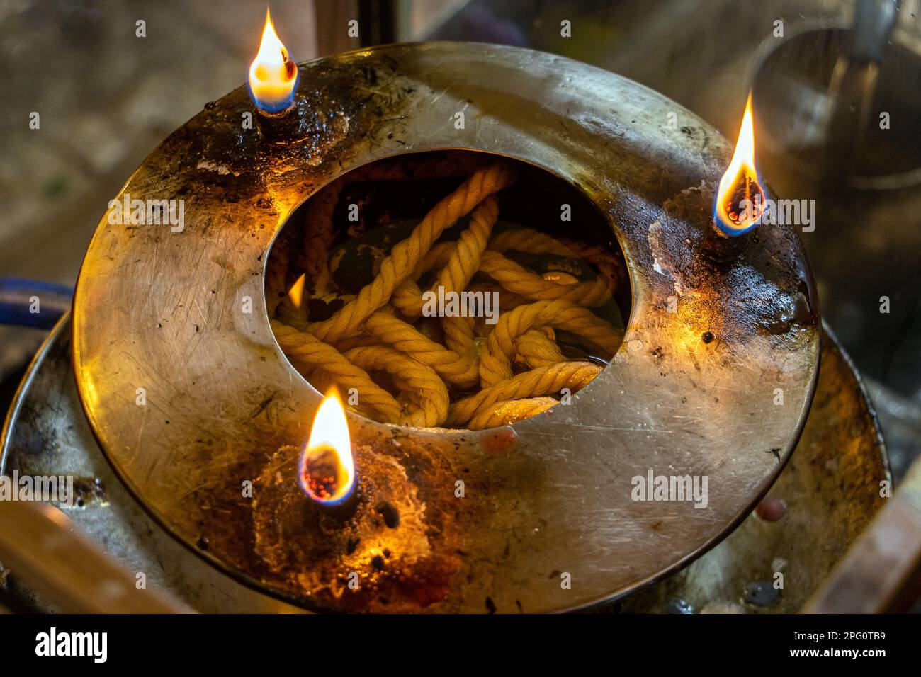 Oil lamp with woman inside outlet