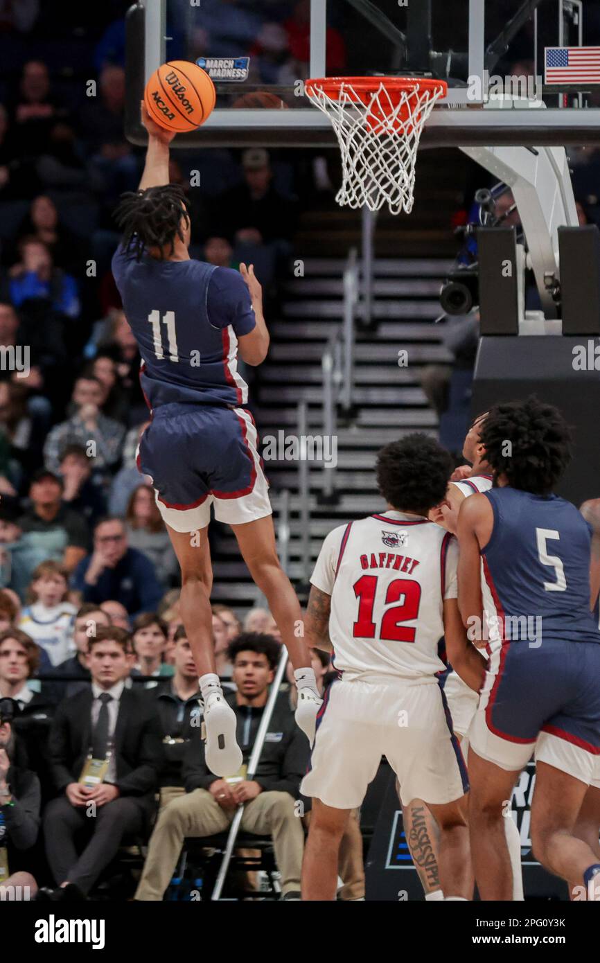 Columbus, Ohio, USA. 19th Mar, 2023. Fairleigh Dickinson Knights forward Sean Moore (11) puts up