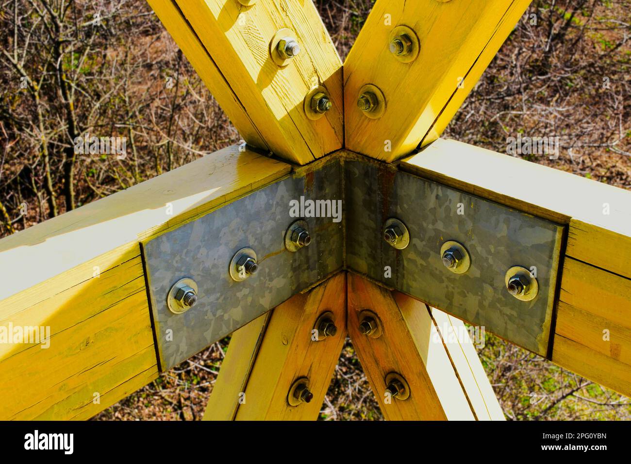 wood beam bolted structural joint. engineered galvanized structure