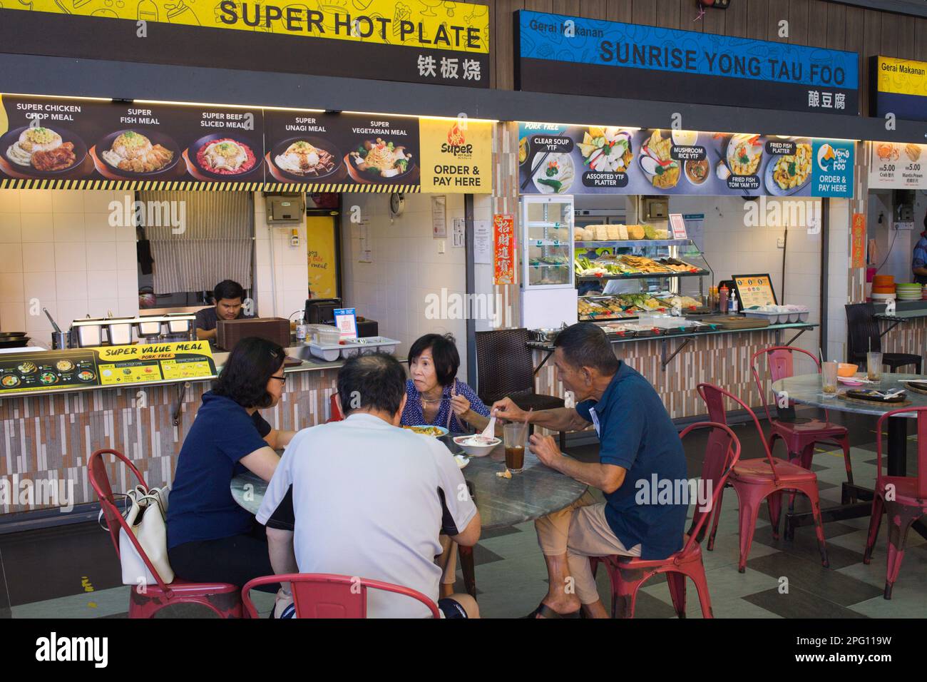 Malaysia, Penang, food court, people, eating Stock Photo